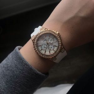 White and rose gold GUESS watch